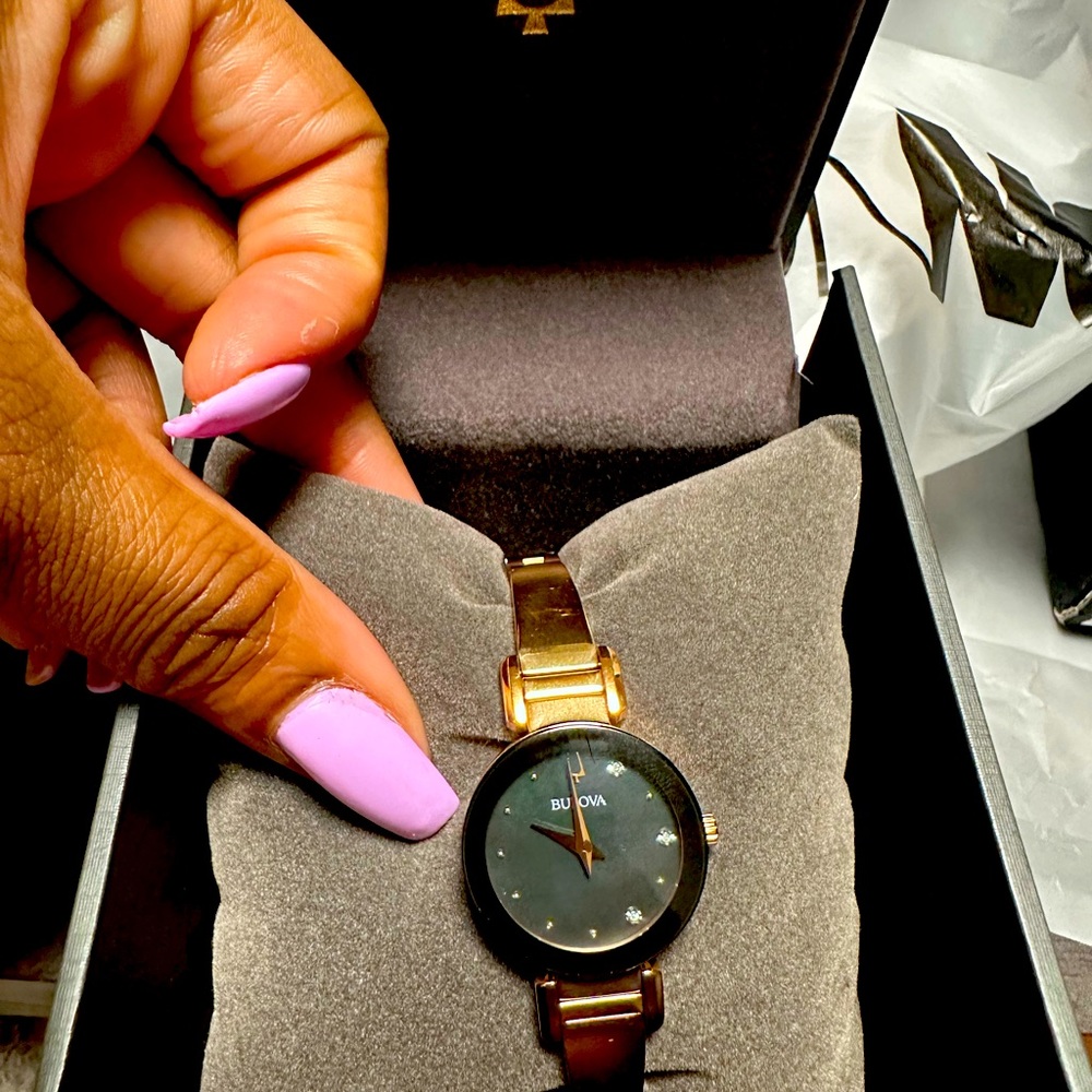 Woman’s Bulova watch. Brand new was given as a gift, but not my style.